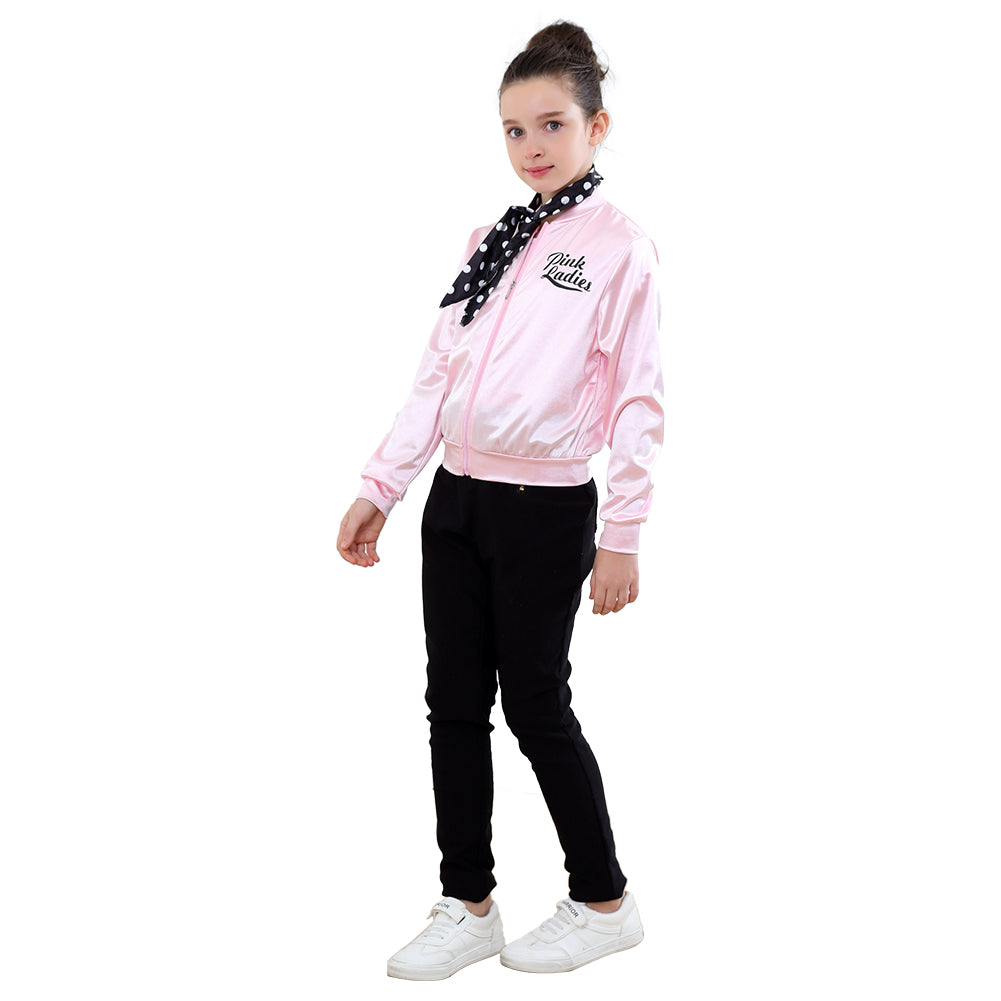 Déguisement enfant Grease années 50 pour fille, style vintage chic avec robe à pois et accessoires rétro, idéal pour les fêtes.