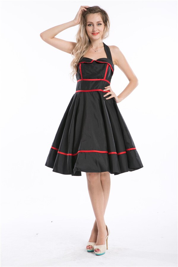 Robe vintage Rockabilly des années 70, style rétro chic, avec motifs colorés, cintrée à la taille et jupe évasée.