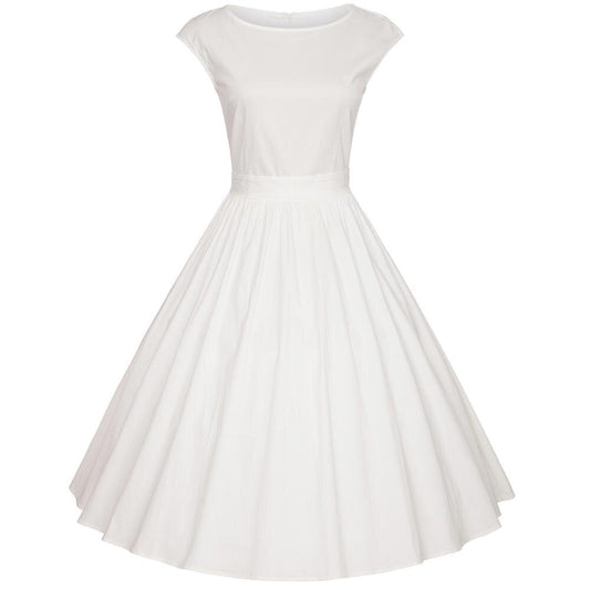 Robe blanche vintage des années 70, style chic avec des motifs rétro, idéale pour une allure nostalgique et élégante.